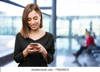 Young Pretty Woman With Mobile Phone