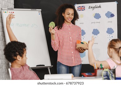 Young Pretty Woman As A Teacher On English Classes