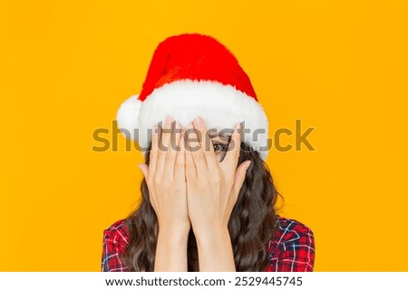 Image, Stock Photo Woman peeking through Christmas wrapping paper, festive mood