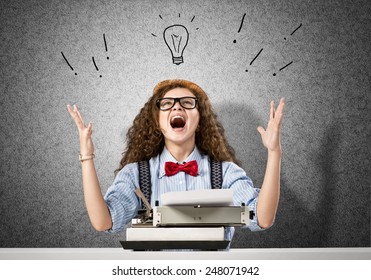 Young pretty woman writer with typing machine - Shutterstock ID 248071942