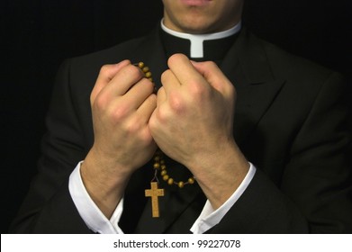 Young Priest Praying