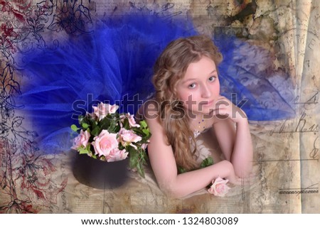 Young princess in a blue evening dress with roses . Beauty, blond.