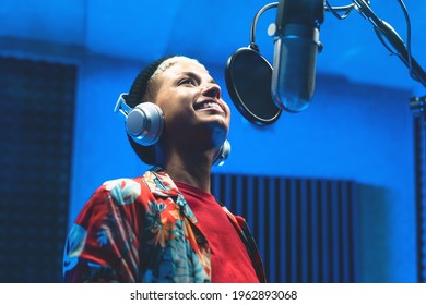 Young Professional Female Singer Recording A New Song Album Inside Music Production Studio  