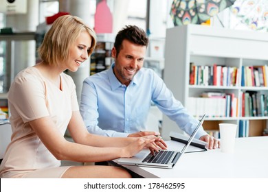 Young Professionals In Front Of A Computer