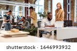 Young professionals. Group of multiracial business people working together in the creative co-working space. Team building concept. Office life. Web banner