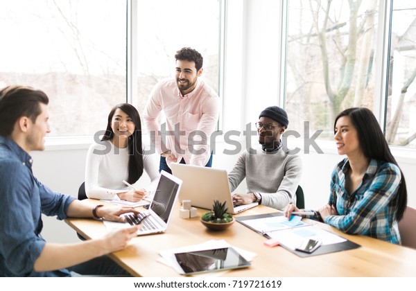 Young Professionals Working On Laptops Office Stock Photo (Edit Now ...