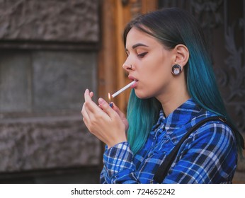 Candid girl on cigarette break