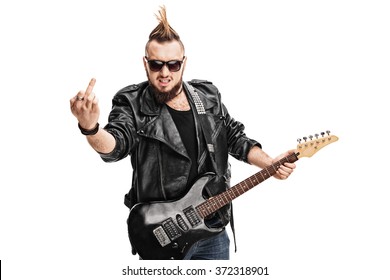 Young Punk Rocker Playing Electric Guitar And Showing His Middle Finger Isolated On White Background