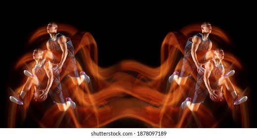 Young Purposeful Basketball Player Training In Action On Black Background With Fire Flames. Mirror, Strobe Light Effect, Reflection. Concept Of Sport, Movement, Energy And Dynamic, Healthy Lifestyle.