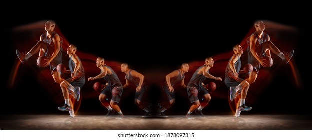 Young Purposeful Basketball Player Training In Action On Black Background With Fire Flames. Mirror, Strobe Light Effect, Reflection. Concept Of Sport, Movement, Energy And Dynamic, Healthy Lifestyle.