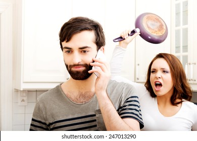 Wife beating her husband