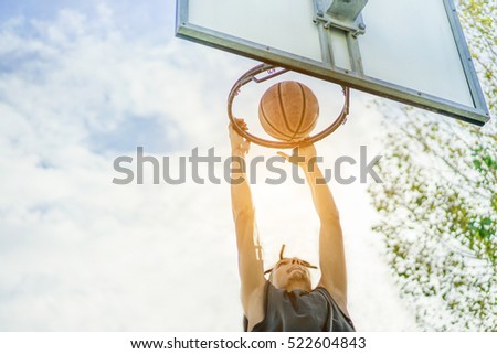 Similar – Foto Bild Mann Schatten Silhouette spielt Basketball auf der Straße