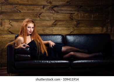 Redhead posing on couch Anal fisting easier than vaginal fisting