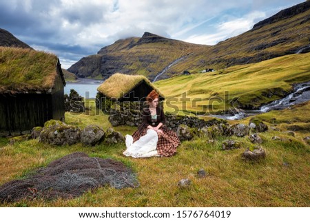 Similar – Image, Stock Photo Young woman over Norwegian fjord