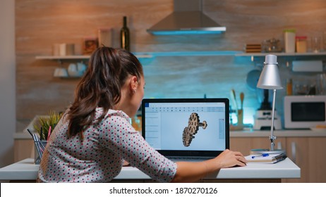 Young Remote Woman Architect Working On Modern Cad Program Overtime. Industrial Female Engineer Studying Prototype Idea On Personal Computer Showing Cad Software On Device Display