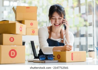 Young Retail SME Asian Businesswoman Call The Phone To Negotiate The Price Of The Product And The Delivery Fee.