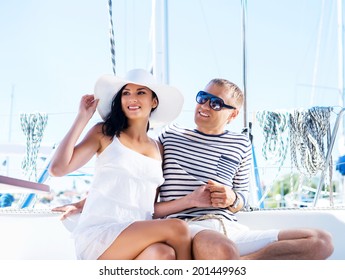 Young, Rich And Attractive Couple On A Sailing Boat