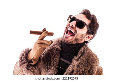 A Young And Rich Man Wearing A Sheepskin Coat Isolated Over A White Background Holding A Cigar