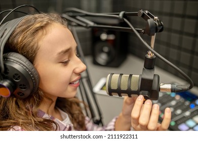 Young RJ Broadcasting A Program From The Radio Station