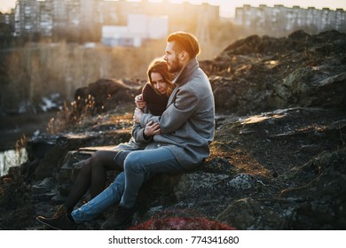 young romantic couple in love. industrial autumn landscape - Shutterstock ID 774341680