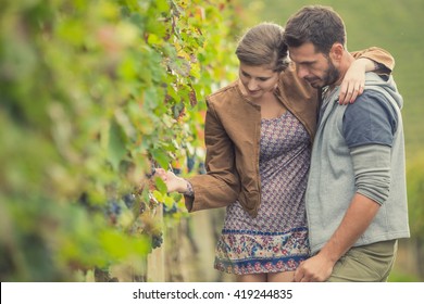 Young Romantic Couple In Vineyard