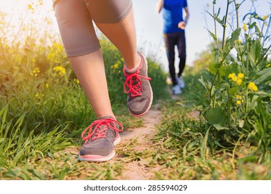 Young Runners Training Outside In Spring Nature