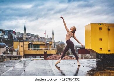 Young russian ballerina dancer doing exercise on a rooftop of Istanbul, Turkey - Powered by Shutterstock