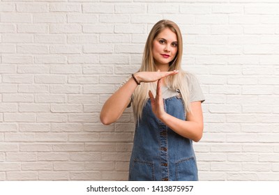 Young Russian Hipster Woman Doing A Timeout Gesture