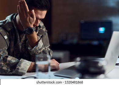 Young Sad Army Soldier Using Computer And Crying While Making Video Chat With Family. 