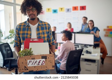 A Young Sad Male Office Employee Is Leaving The Office Since He Got Fired From The Job He Like. Employees, Job, Office