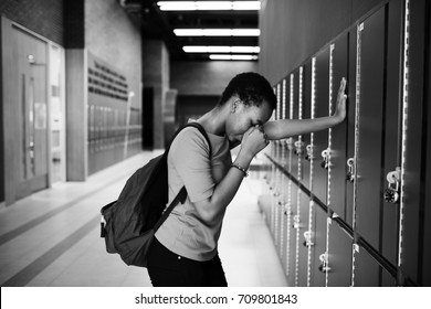 Young Sad Student On The Hallway