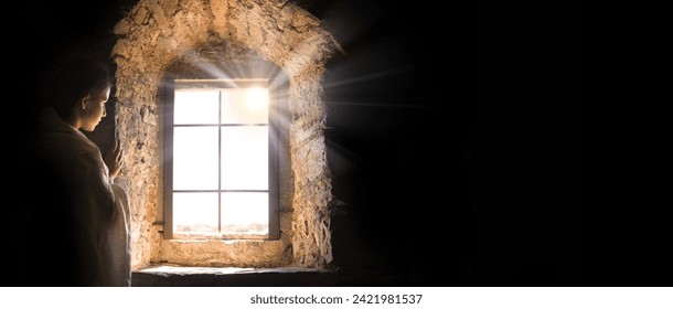 Young sad upset scare worry male Jewish human man face see ask god light faith hope dream love. Teen kid lady stand dark black prison fort house home room wall feel fear bore pain grief war text space - Powered by Shutterstock