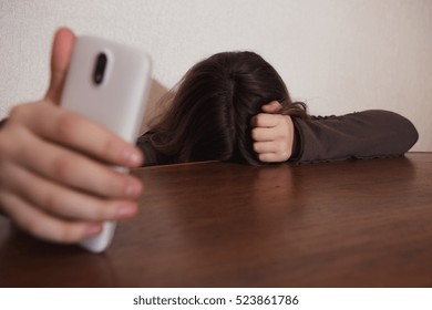 Young Sad Vulnerable Girl Using Mobile Phone Scared And Desperate Suffering Online Abuse Cyberbullying Being Stalked And Harassed In Teenager Cyber Bullying Concept