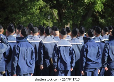 Young sailors dressed a uniform form a line at the Anchor square in the center of Kronstadt, Kotlin Island, Saint Petersburg, Gulf of Finland, Russia, Northern Europe.