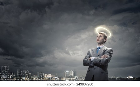 Young Saint Businessman With Halo Above Head