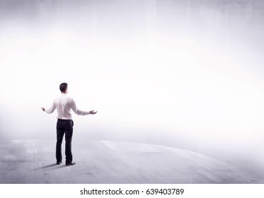 Young Sales Businessman In Elegant Suit Standing With His Back In Empty White Space Background Concept