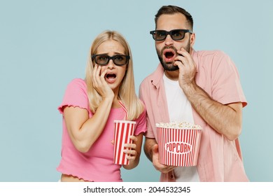 Young Scared Couple Family Man Woman Friends In 3d Glasses Watch Movie Film Hold Bucket Of Popcorn Cup Of Soda Pop Isolated On Plain Blue Background Studio People Emotions In Cinema Lifestyle Concept