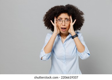 Young Scared Shocked Displeased Employee Business Corporate Lawyer Woman Of African American Ethnicity 20s Wear Classic Formal Shirt Work In Office Hold Face Isolated On Grey Color Background Studio