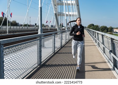 Young School Or College University Student Fit Teen Girl Morning Routine Of Exercising Outdoor. Fitness Female Morning Workout Training For Healthy Life Before Study Time.