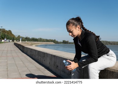 Young School Or College University Student Fit Teen Girl Morning Routine Of Exercising Outdoor. Fitness Female Morning Workout Training For Healthy Life Before Study Time.