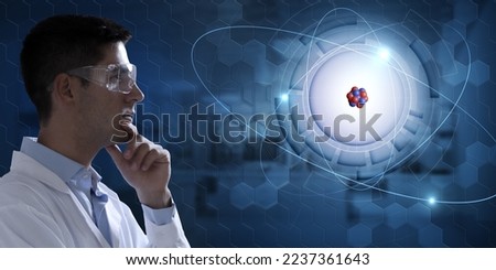 Young scientist analysing holographic atomic structure: glowing electrons orbiting around nucleus. Concept of  breakthrough in nuclear physics. 3d rendering element.