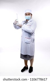 Young Scientist Holding The Tube In Laboratory With Full Body Shot