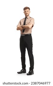 Young security officer posing with folded arms isolated on white background