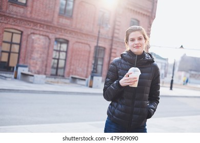 Candid street, skinny pants and shiny down jacket