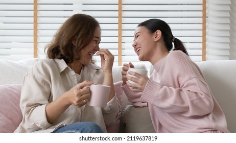 Young senior citizen authentic real family sit talk to grown up children kid with love share moment at home living room feeling positive relax enjoy listen to child girl. Parent coach communication. - Powered by Shutterstock