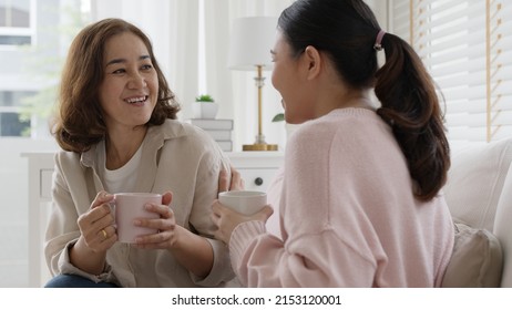 Young Senior Citizen Authentic Real Family Sit Talk To Grown Up Children Kid With Love Share Moment At Home Living Room Feeling Positive Relax Enjoy Listen To Child Girl. Parent Coach Communication.