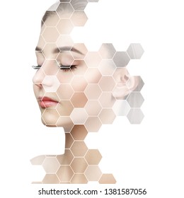 Young sensual woman with mosaic honeycombs on face. Over white background.