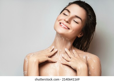 Young Sensual Woman Washing Her Body With Shower Gel