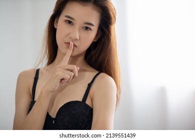 Young Sexy Asian Women Shows Shush Sign, Shut Your Mouth, Finger On Lips, Silent Gesture