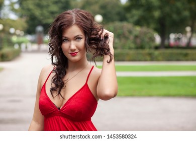 Busty Babe in red
